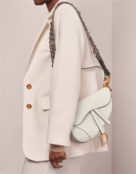 cream dior saddle bag